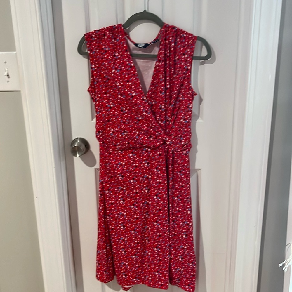 Red dress with white and blue stars and with crossover top